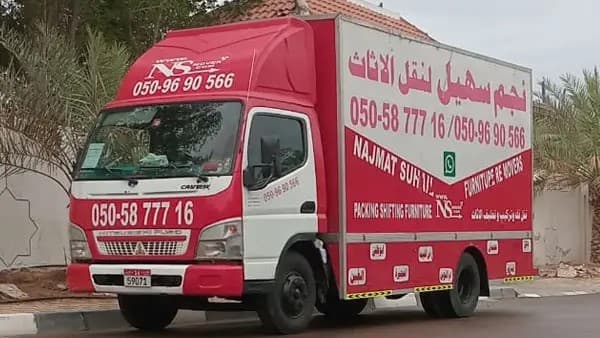 Restaurant furniture moving truck on abu dhabi road